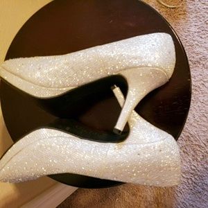 Women high heeled silver shoe